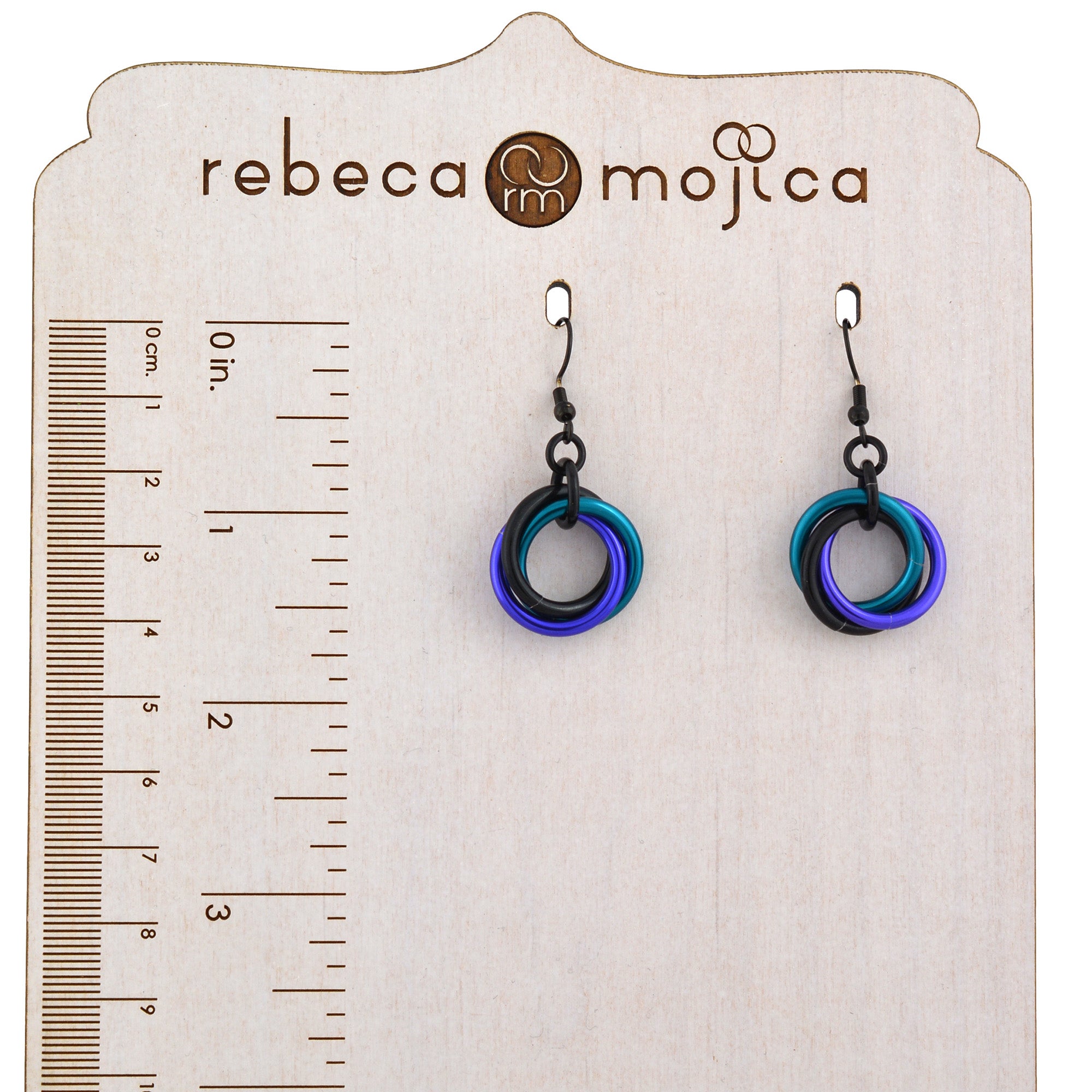 Size reference for Single Knot chainmail earrings in Dark Mermaid colors (purple, teal, black), showing the approximate 1.5-inch length next to a ruler.