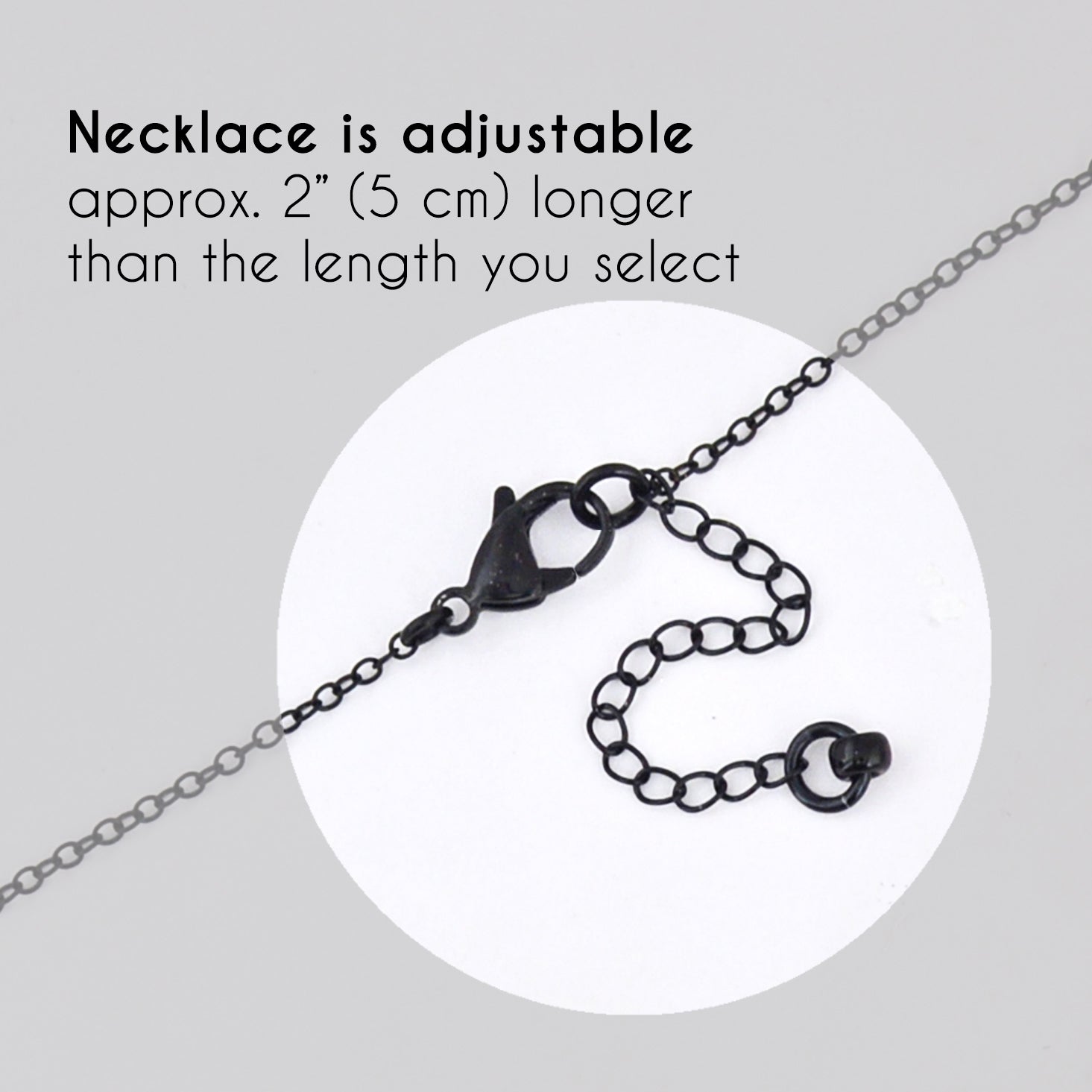 graphic showing a black lobster claw clasp and chain. Text at top reads: Necklace is adjustable approx 2" (5 cm) longer than the length you select)