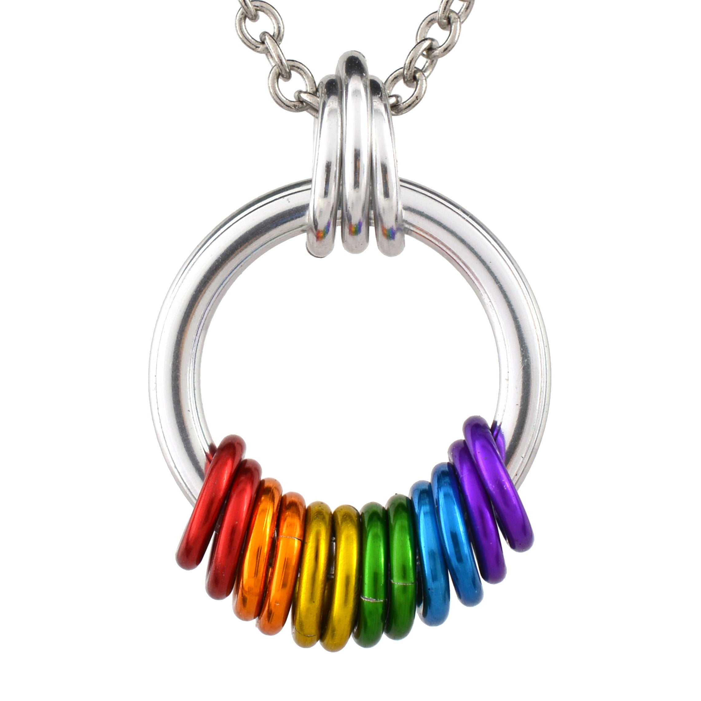 Closeup of the rainbow pride coiled pendant on a white background. A chunky silver loop hangs from a trio of smaller silver links. At the bottom of the loop are 12 vibrant links in the color of the lgbtq rainbow pride flag, from left to right: 2 each red, orange, yellow, green, blue, and violet.