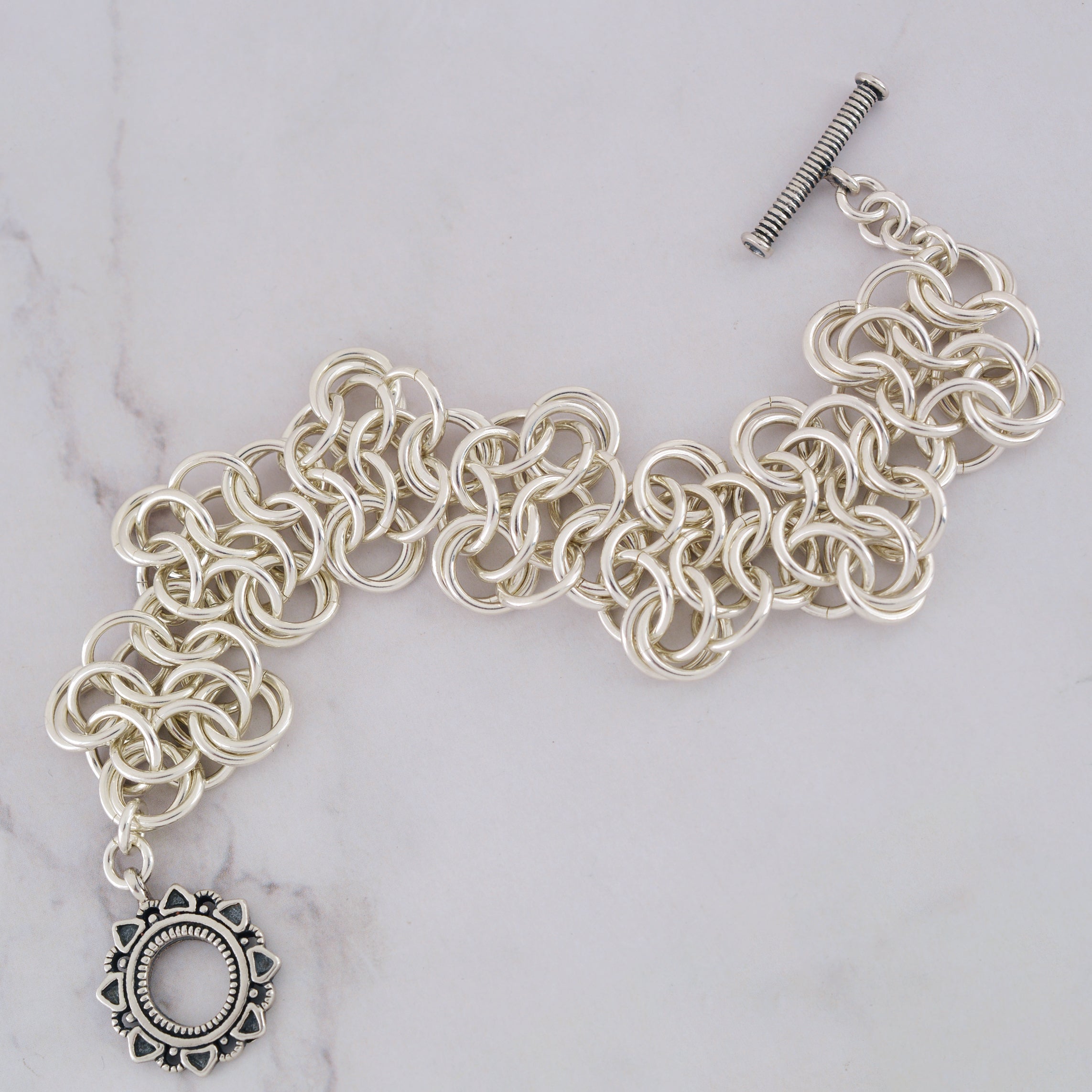 SALE: Sterling Silver Mobiused Rosettes - XS (approx 6.5")