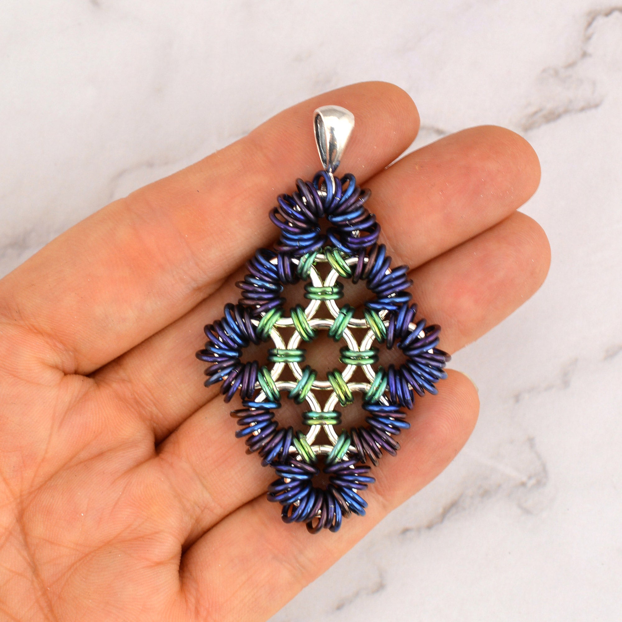 SALE: Coiled Japanese Diamond Pendant in Sterling Silver and Niobium