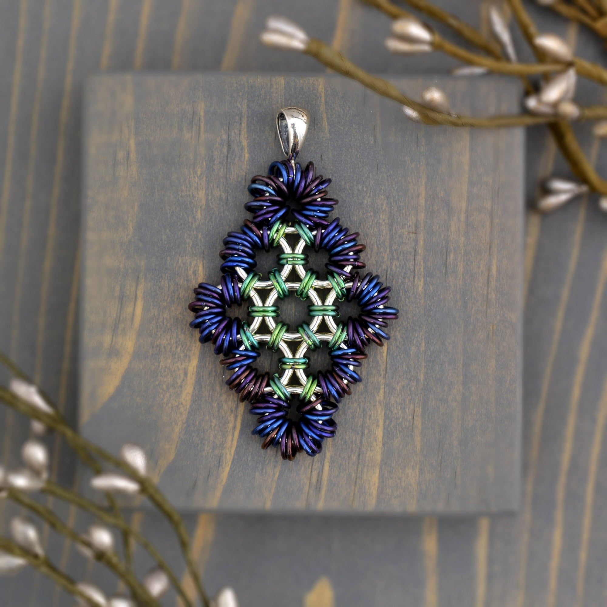 SALE: Coiled Japanese Diamond Pendant in Sterling Silver and Niobium