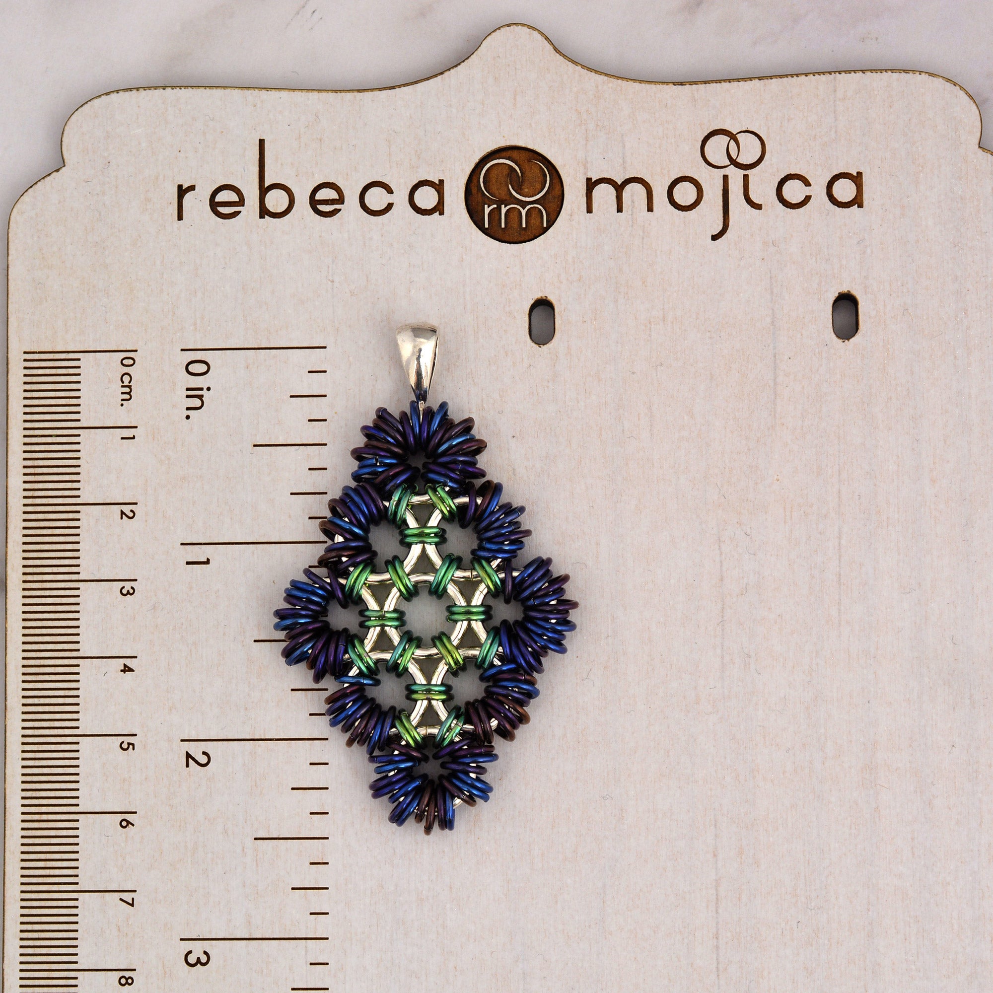 SALE: Coiled Japanese Diamond Pendant in Sterling Silver and Niobium