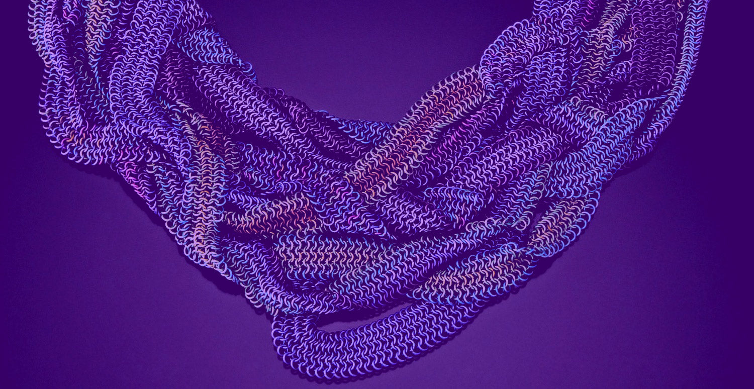 Close up of a cool color micromaille chainmail necklace with a transparent purple overlay