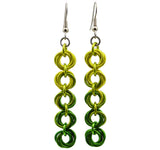 Chainmaille earrings of 5 linked "knots" hanging from the earwire on white background. Top knot is bright yellow transitioning as you move down the earring to lime and green.