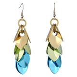 A pair of scalemaille earrings in the Seashell colorway (champagne, seafoam, and light blue) is shown on a pure white background, highlighting the details of each individual scale.