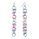 Subtle Transgender Pride Earrings: Product shot of long, lightweight chainmaille earrings with a matte light blue, pink, and white finish. Isolated on white background.