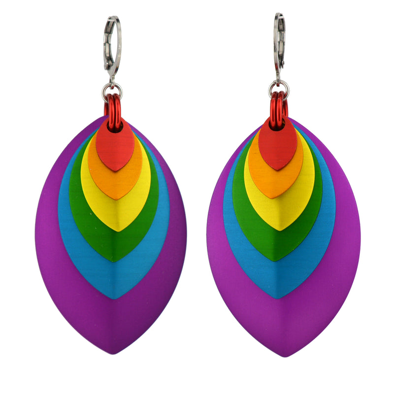 A pair of vibrant rainbow-colored stacked leaf earrings with stainless steel round leverback ear wires, displayed against a plain white background. The leaves are red, orange, yellow, green, light blue, and purple, arranged from smallest to largest with purple as the largest outermost leaf.