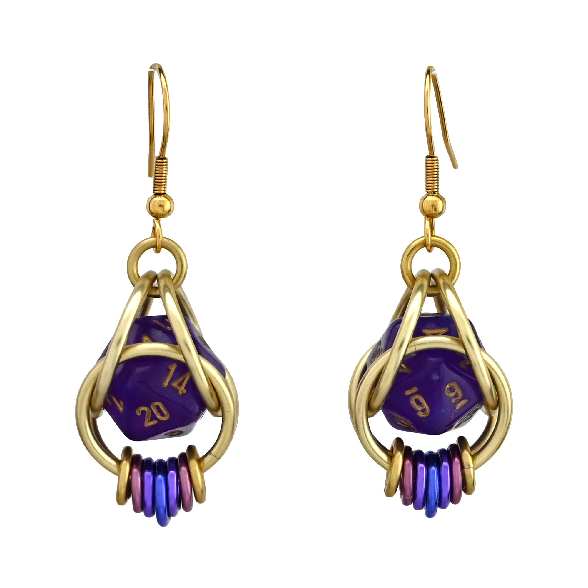 A pair of Wisteria Fae d20 earrings featuring amethyst purple mini dice suspended in light gold aluminum chainmaille cages with a coil of smaller links in an ombre of gold, pink, lilac and lavender at the base.