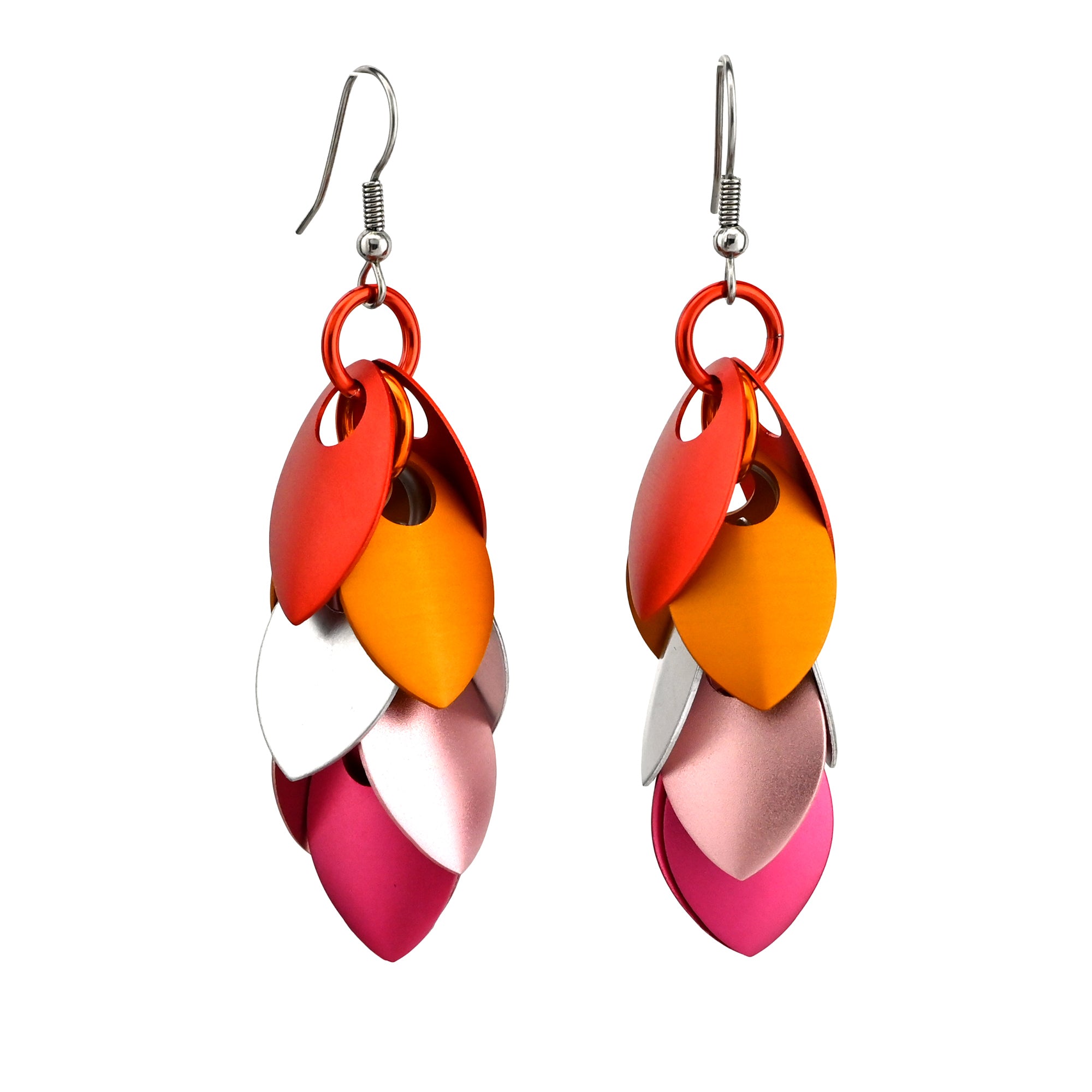 A pair of cascading scale earrings featuring the five colors of the Lesbian Pride flag: orange, light orange, white, pink, and fuchsia. The aluminum leaves overlap like feathers and hang from stainless steel earwires.