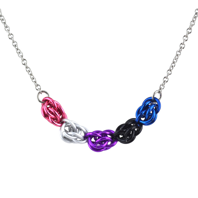 genderfluid pride necklace on steel chain on white background. Necklace is chainmaille, with one segment in each color of the genderfluid pride flag: pink, white, purple, black and blue