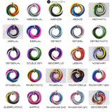 A grid displaying 25 chainmaille swirl pendants, each representing a different LGBTQ+ Pride flag. Each pendant has a label indicating the specific flag it represents. Row 1 Rainbow, abrosexual, agender, aroace, aromantic. Row 2 asexual, bisexual, demiboy, demigirl, demiromantic. Row 3 demisexual, double demi, genderfluid, lesbian, nonbinary. Row 4 omnisexual, panromantic, pansexual, polyamorous, polyamory new. Row 5 queerplatonic, sapphic, transgender bold, transgender light, xenogender. The logo for artisa