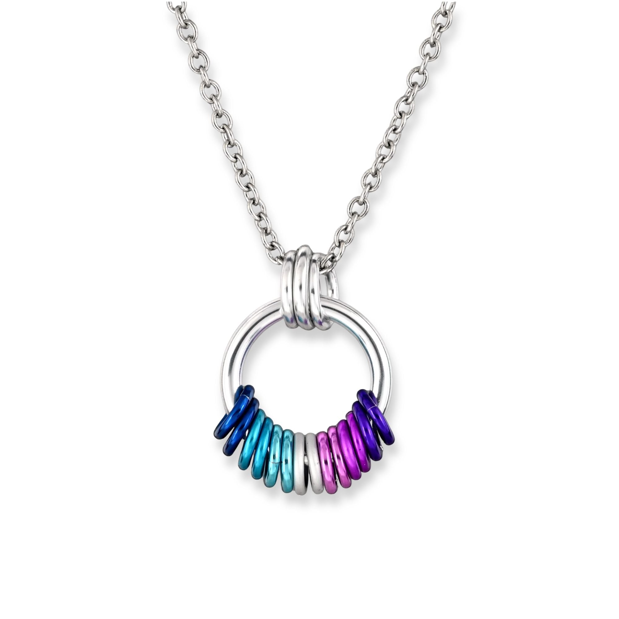 A silver-tone  chainmaille pendant with a cluster of free-spinning rings in Berrisexual flag colors: a vibrant gradient of deep blue, cyan, white, violet and purple.