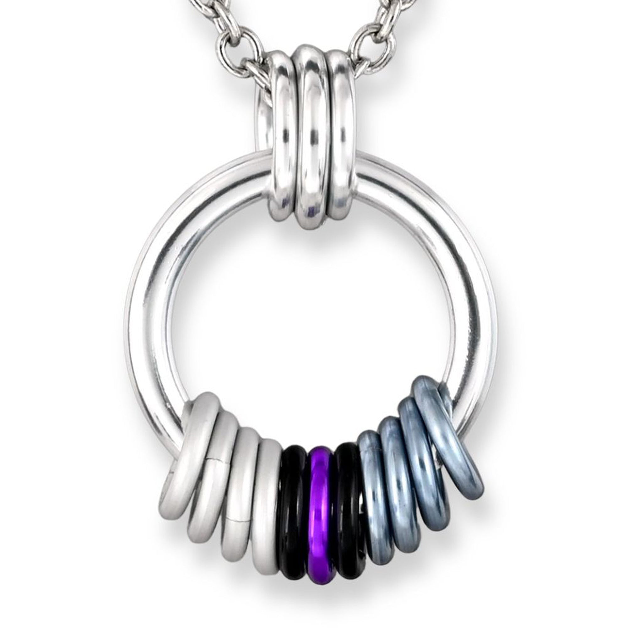 Closeup of the demisexual pride pendant on a white background. A thick silver loop hangs from a trio of smaller silver links. At the bottom of the loop are 12 vibrant links in the color of the demisexual pride flag, from left to right: 2 black, 3 white, 2 violet, 3 light grey, 2 black. The rings sit loosely at the base, indicating they can slide and spin freely.