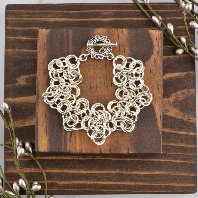 SALE: Sterling Silver Mobiused Rosettes - XS (approx 6.5")