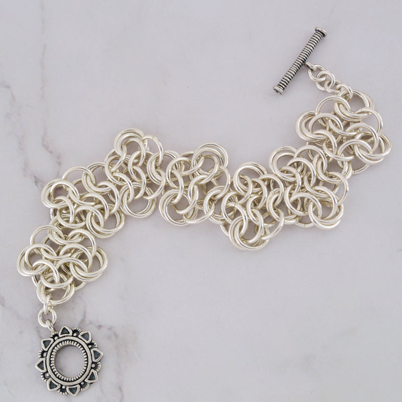 SALE: Sterling Silver Mobiused Rosettes - XS (approx 6.5")