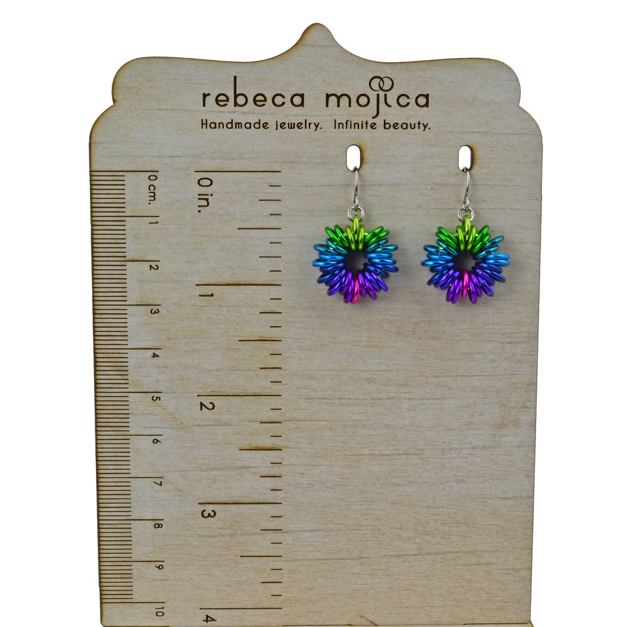 Coiled Earring on ruler display showing length is approximately 1.25"