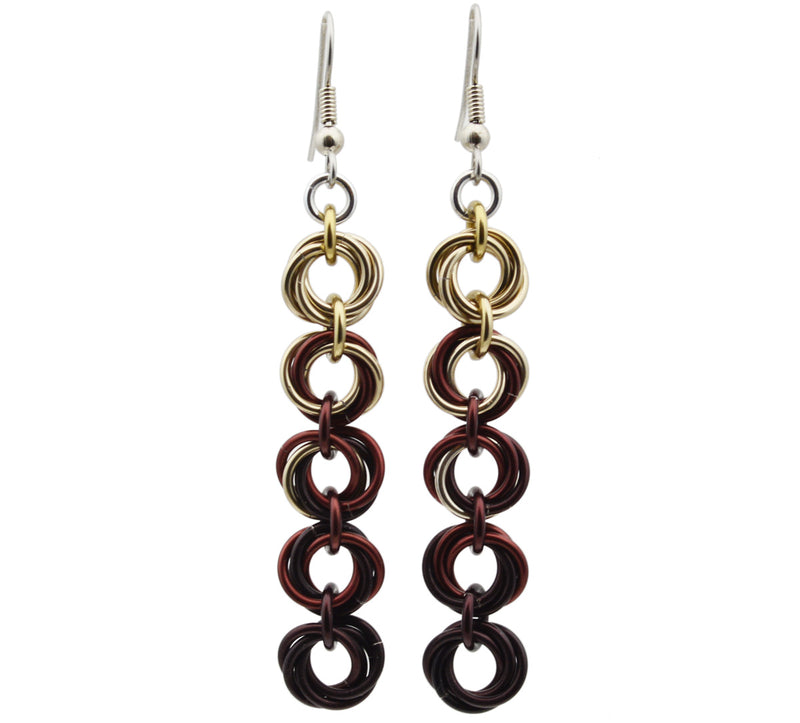 Chainmaille earrings of 5 linked "knots" hanging from the earwire on white background. Top knot is champagne transitioning as you move down the earring to brown and dark brown.