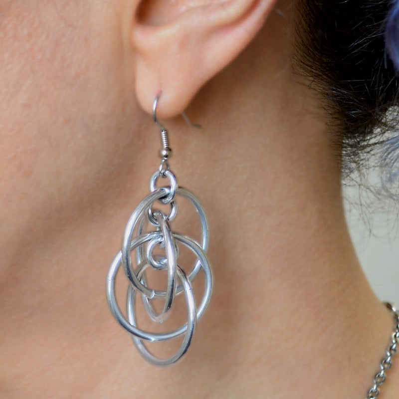 Intertwined hoop earrings sale