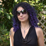 Chainmaille artisan Rebeca Mojica wearing her Stainless Steel Auger Pendant. 